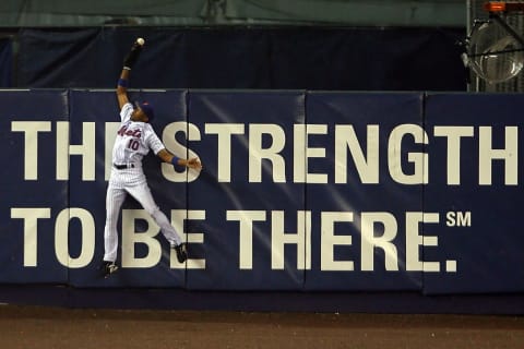 NEW YORK – OCTOBER 19: Endy Chavez #10 of the New York Mets catches a ball hit in the sixth inning hit by Scott Rolen #27 of the St. Louis Cardinals during game seven of the NLCS at Shea Stadium on October 19, 2006 in the Flushing neighborhood of the Queens borough of New York City. (Photo by Nick Laham/Getty Images)