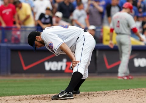 NEW YORK – JULY 24: Oliver Perez #46 of the New York Mets reacts after getting into a bases loaded jam in the eighth inning against the Philadelphia Phillies on July 24, 2008 at Shea Stadium in the Flushing neighborhood of the Queens borough of New York City. (Photo by Jim McIsaac/Getty Images)