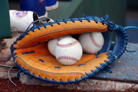 PHILADELPHIA, PA – AUGUST 12: A catchers mitt and balls sit on the steps of the dugout before a game between the New York Mets and the Philadelphia Phillies at Citizens Bank Park on August 12, 2017 in Philadelphia, Pennsylvania. The Phillies won 3-1. (Photo by Hunter Martin/Getty Images) *** Local Caption ***