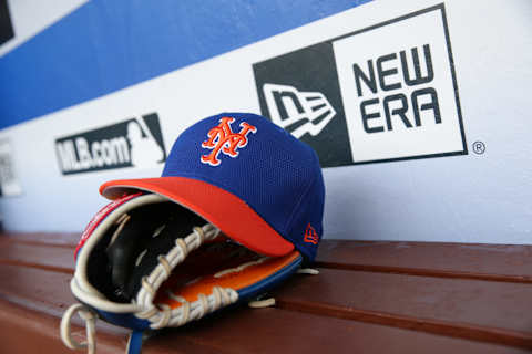 PHILADELPHIA, PA – AUGUST 12: A baseball hat and a glove sit on the bench in the dugout before a game between the New York Mets and the Philadelphia Phillies at Citizens Bank Park on August 12, 2017 in Philadelphia, Pennsylvania. The Phillies won 3-1. (Photo by Hunter Martin/Getty Images) *** Local Caption ***