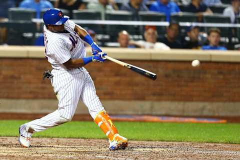 NEW YORK, NEW YORK – AUGUST 21: Yoenis Cespedes #52 of the New York Mets singles to center in the sixth inning against the Arizona Diamondbacks at Citi Field on August 21, 2017 in the Flushing neighborhood of the Queens borough of New York City. (Photo by Mike Stobe/Getty Images)