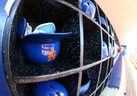 PORT ST. LUCIE, FL – MARCH 06: Helmets in the New York Mets dugout before of a spring training game against the Houston Astros at First Data Field on March 6, 2018 in Port St. Lucie, Florida. (Photo by Rich Schultz/Getty Images)