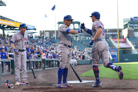 DENVER, CO – JUNE 18: Brandon Nimmo #9 of the New York Mets celebrates with Asdrubal Cabrera #13 and Todd Frazier #21 after scoring on a first inning inside-the-park homerun against the Colorado Rockies at Coors Field on June 18, 2018 in Denver, Colorado. (Photo by Dustin Bradford/Getty Images)