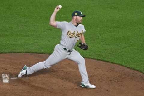 BALTIMORE, MD – SEPTEMBER 12: Liam Hendriks #16 of the Oakland Athletics pitches during a baseball game against the Baltimore Orioles at Oriole Park at Camden Yards on September 12, 2018 in Baltimore, Maryland. (Photo by Mitchell Layton/Getty Images)