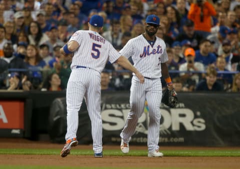 NEW YORK, NY – SEPTEMBER 29: David Wright #5 and Jose Reyes #7 of the New York Mets in action against the Miami Marlins at Citi Field on September 29, 2018 in the Flushing neighborhood of the Queens borough of New York City. The Mets defeated the Marlins 1-0 in 13 innings. (Photo by Jim McIsaac/Getty Images)