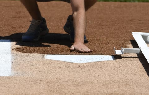 CHICAGO, ILLINOIS – JUNE 22: A details shot of a home plate before the game between the Chicago Cubs and the New York Mets at Wrigley Field on June 22, 2019 in Chicago, Illinois. (Photo by David Banks/Getty Images)