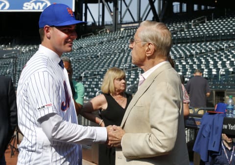 NEW YORK, NEW YORK – JUNE 28: (NEW YORK DAILIES OUT) New York Mets 2019 third round draft pick Matthew Allan greets team majority owner Fred Wilpon during batting practice prior to a game against the Atlanta Braves at Citi Field on Friday, June 28, 2019 in the Queens borough of New York City. The Braves defeated the Mets 6-2. (Photo by Jim McIsaac/Getty Images)