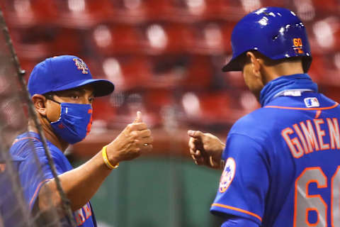 BOSTON, MA – JULY 28: Manager Luis Rojas and Andres Gimenez #60 of the New York Mets celebrates after Gimenez scored in the eighth inning against the Boston Red Sox at Fenway Park on July 28, 2020 in Boston, Massachusetts. (Photo by Adam Glanzman/Getty Images)