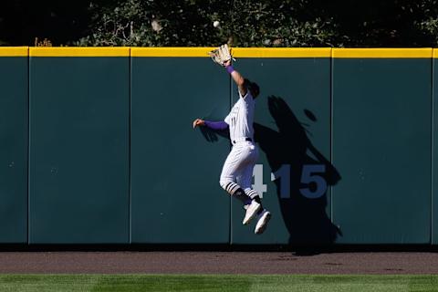 DENVER, CO – SEPTEMBER 2: Centerfielder Kevin Pillar #11 of the Colorado Rockies makes a leaping catch at the wall for the final out of the seventh inning against the San Francisco Giants at Coors Field on September 2, 2020 in Denver, Colorado. (Photo by Justin Edmonds/Getty Images)