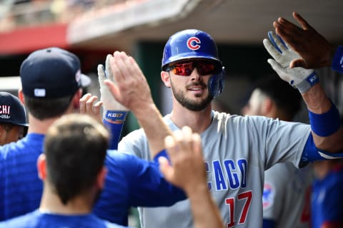 CINCINNATI, OH – JULY 3: Kris Bryant #17 of the Chicago Cubs high fives teammates in the dugout after hitting a home run in the third inning against the Cincinnati Reds at Great American Ball Park on July 3, 2021 in Cincinnati, Ohio. (Photo by Jamie Sabau/Getty Images)