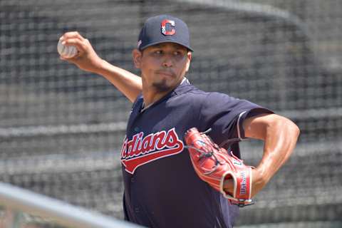 CLEVELAND, OHIO – JULY 06: Pitcher Carlos Carrasco #59 of the Cleveland Indians throws in the bullpen during summer workouts at Progressive Field on July 06, 2020 in Cleveland, Ohio. (Photo by Jason Miller/Getty Images)