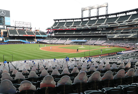 NEW YORK, NEW YORK – JULY 24: Jacob deGrom #48 of the New York Mets pitches against the Atlanta Braves during Opening Day at Citi Field on July 24, 2020 in New York City. Cardboard cutouts of fans are placed in the seats as no real fans are allowed at the games due to the COVID-19 pandemic. The 2020 season had been postponed since March due to the COVID-19 pandemic. (Photo by Al Bello/Getty Images)