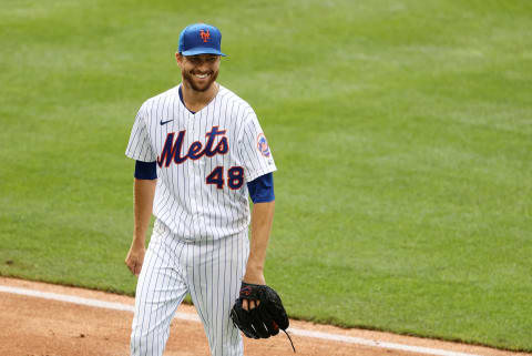 NEW YORK, NEW YORK – JULY 24: Jacob deGrom #48 of the New York Mets smiles as he leaves the game after the fifth inning against the Atlanta Braves during Opening Day at Citi Field on July 24, 2020 in New York City. The 2020 season had been postponed since March due to the COVID-19 pandemic. (Photo by Al Bello/Getty Images)