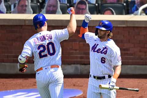 NEW YORK, NEW YORK – SEPTEMBER 06: Pete Alonso #20 of the New York Mets is congratulated by his teammate Jeff McNeil #6 after hitting a solo home run against the Philadelphia Phillies during the second inning at Citi Field on September 06, 2020 in New York City. (Photo by Steven Ryan/Getty Images)