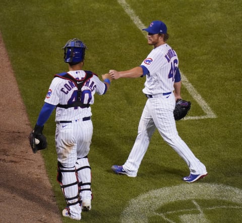 CHICAGO, ILLINOIS – SEPTEMBER 06: Willson Contreras #40 of the Chicago Cubs fist bumps Craig Kimbrel #46 after the seventh inning of a game against the St. Louis Cardinals at Wrigley Field on September 06, 2020 in Chicago, Illinois. (Photo by Nuccio DiNuzzo/Getty Images)