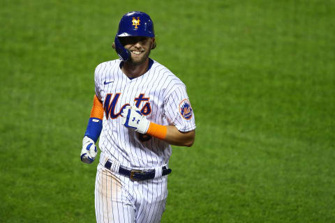 NEW YORK, NEW YORK – SEPTEMBER 09: Jeff McNeil #6 of the New York Mets smiles after hitting a 2-run home run to left field in the fourth inning against the Baltimore Orioles at Citi Field on September 09, 2020 in New York City. (Photo by Mike Stobe/Getty Images)