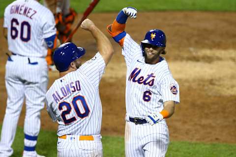 NEW YORK, NEW YORK – SEPTEMBER 09: Jeff McNeil #6 of the New York Mets celebrates with Pete Alonso #20 after hitting a 2-run home run to left field in the fourth inning against the Baltimore Orioles at Citi Field on September 09, 2020 in New York City. (Photo by Mike Stobe/Getty Images)