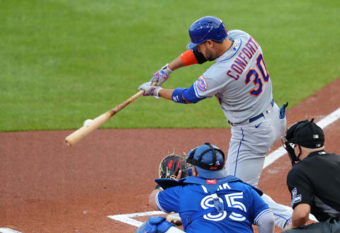 BUFFALO, NY – SEPTEMBER 12: Michael Conforto #30 of the New York Mets gets a hit against the Toronto Blue Jays at Sahlen Field on September 12, 2020 in Buffalo, New York. (Photo by Timothy T Ludwig/Getty Images)