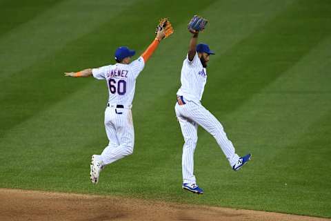 NEW YORK, NEW YORK – SEPTEMBER 19: Andres Gimenez #60 and Amed Rosario #1 of the New York Mets celebrate during the ninth inning against the Atlanta Braves at Citi Field on September 19, 2020 in the Queens borough of New York City. The Mets won 7-2. (Photo by Sarah Stier/Getty Images)