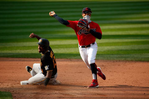 CLEVELAND, OH – SEPTEMBER 27: Francisco Lindor #12 of the Cleveland Indians forces out Ke’Bryan Hayes #13 of the Pittsburgh Pirates at second base during the game at Progressive Field on September 27, 2020 in Cleveland, Ohio. (Photo by Kirk Irwin/Getty Images)