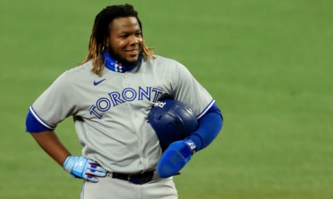 ST PETERSBURG, FLORIDA – SEPTEMBER 29: Vladimir Guerrero Jr. #27 of the Toronto Blue Jays looks on during the Wild Card Round Game One against the Tampa Bay Rays at Tropicana Field on September 29, 2020 in St Petersburg, Florida. (Photo by Mike Ehrmann/Getty Images)