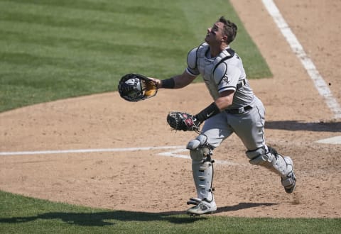 OAKLAND, CALIFORNIA – SEPTEMBER 29: James McCann #33 of the Chicago White Sox tracks a foul pop-up against the Oakland Athletics during the seventh inning of the Wild Card Round Game One at RingCentral Coliseum on September 29, 2020 in Oakland, California. (Photo by Thearon W. Henderson/Getty Images)