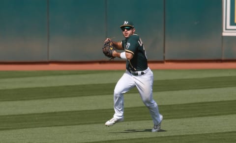 OAKLAND, CA – SEPTEMBER 20: Ramón Laureano #22 of the Oakland Athletics fields during the game against the San Francisco Giants at RingCentral Coliseum on September 20, 2020 in Oakland, California. The Giants defeated the Athletics 14-2. (Photo by Michael Zagaris/Oakland Athletics/Getty Images)