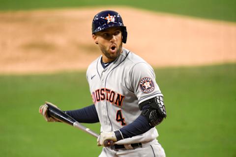 SAN DIEGO, CALIFORNIA – OCTOBER 11: George Springer #4 of the Houston Astros reacts after striking out against the Tampa Bay Rays during the fifth inning in game one of the American League Championship Series at PETCO Park on October 11, 2020 in San Diego, California. (Photo by Harry How/Getty Images)