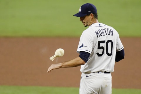 SAN DIEGO, CALIFORNIA – OCTOBER 17: Charlie Morton #50 of the Tampa Bay Rays reacts to walking Martin Maldonado #15 of the Houston Astros during the sixth inning in Game Seven of the American League Championship Series at PETCO Park on October 17, 2020 in San Diego, California. (Photo by Harry How/Getty Images)