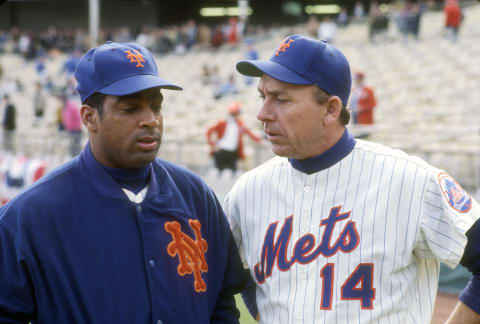 NEW YORK – CIRCA 1969: Manager Gil Hodges #14 of the New York Mets talks with a player prior to the start of a Major League Baseball game circa 1969 at Shea Stadium in the Queens borough of New York City. Hodges managed the Mets from 1968-71. (Photo by Focus on Sport/Getty Images)