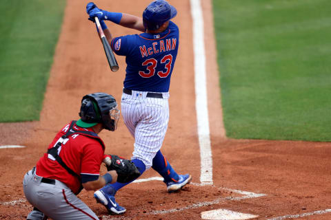 PORT ST. LUCIE, FLORIDA – MARCH 18: James McCann #33 of the New York Mets doubles for a run in the first inning against the Washington Nationals in a spring training game at Clover Park on March 18, 2021 in Port St. Lucie, Florida. (Photo by Mark Brown/Getty Images)