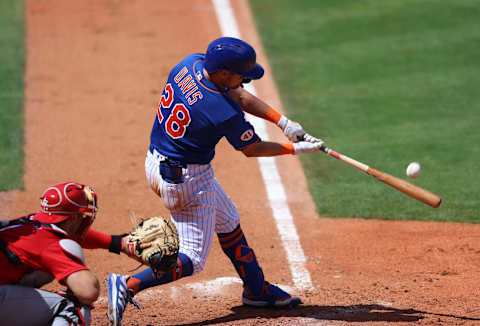 PORT ST. LUCIE, FLORIDA – MARCH 19: J.D. Davis #28 of the New York Mets singles in the fourth inning against the St. Louis Cardinals in a spring training game at Clover Park on March 19, 2021 in Port St. Lucie, Florida. (Photo by Mark Brown/Getty Images)