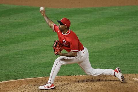 ANAHEIM, CALIFORNIA – MARCH 28: Raisel Iglesias #32 of the Los Angeles Angels pitches against the Los Angeles Dodgers during a MLB spring training game on March 28, 2021 in Anaheim, California. (Photo by Michael Owens/Getty Images)