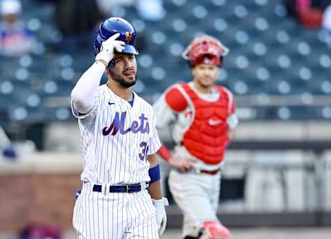 NEW YORK, NEW YORK – APRIL 13: Michael Conforto #30 of the New York Mets heads to first after he was hit by a pitch in the sixth inning against the Philadelphia Phillies during game one of a double header at Citi Field on April 13, 2021 in the Flushing neighborhood of the Queens borough in New York City. (Photo by Elsa/Getty Images)