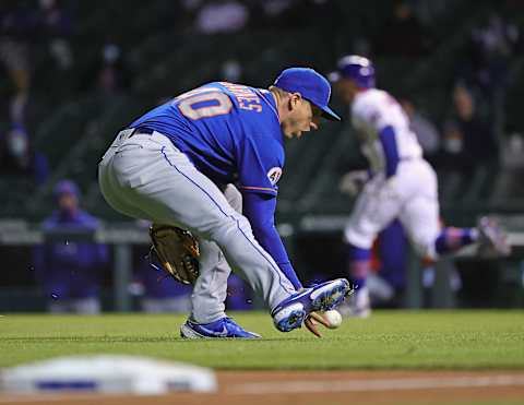 CHICAGO, ILLINOIS – APRIL 20: Jacob Barnes #40 of the New York Mets fields the ball against the Chicago Cubs at Wrigley Field on April 20, 2021 in Chicago, Illinois. The Cubs defeated the Mets 3-1. (Photo by Jonathan Daniel/Getty Images)