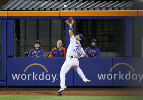 NEW YORK, NEW YORK – MAY 11: Michael Conforto #30 of the New York Mets catches a sacrifice fly hit by Pat Valaika of the Baltimore Orioles as a run is scored in the seventh inning at Citi Field on May 11, 2021 in the Flushing neighborhood of the Queens borough of New York City. (Photo by Elsa/Getty Images)