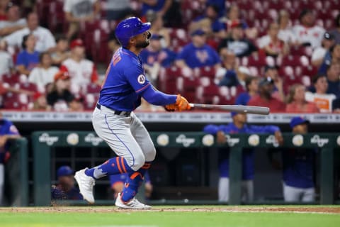 CINCINNATI, OHIO – JULY 19: Kevin Pillar #11 of the New York Mets hits a home run in the eleventh inning against the Cincinnati Reds at Great American Ball Park on July 19, 2021 in Cincinnati, Ohio. (Photo by Dylan Buell/Getty Images)