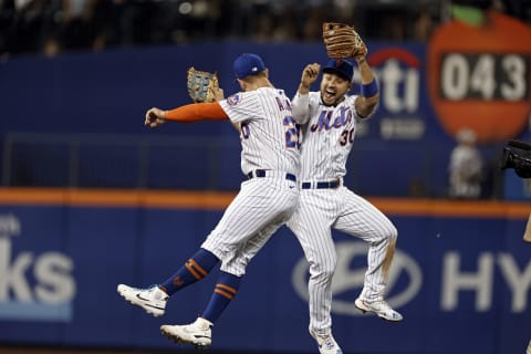 NEW YORK, NY – JULY 28: Michael Conforto #30 of the New York Mets and Pete Alonso #20 of the New York Mets celebrate after the Mets defeated the Atlanta Braves at Citi Field on July 28, 2021 in New York City. The Mets won 2-1. (Photo by Adam Hunger/Getty Images)