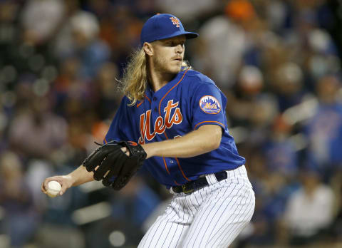 NEW YORK, NEW YORK – SEPTEMBER 28: Noah Syndergaard #34 of the New York Mets pitches during the first inning in game 2 of a double header against the Miami Marlins at Citi Field on September 28, 2021 in New York City. The Mets defeated the Marlins 2-1 in nine innings. (Photo by Jim McIsaac/Getty Images)