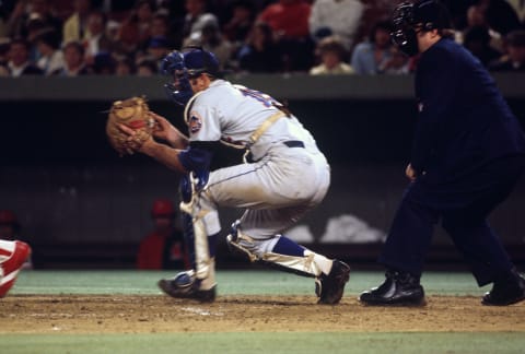 ST LOUIS, MO – CIRCA 1970: Catcher Jerry Grote #15 of the New York Mets in action against the St Louis Cardinals during an Major League Baseball game circa 1970 at Busch Stadium in St Louis, Missouri. Grote played for the Mets from 1966-77. (Photo by Focus on Sport/Getty Images)