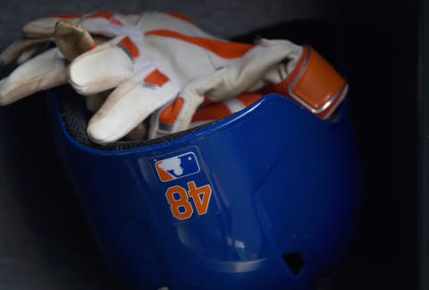 SAN FRANCISCO, CA – JULY 08: The batting helmet and batting gloves belonging to Jacob deGrom #48 of the New York Mets sits in the rack prior to the game against the San Francisco Giants at AT&T Park on July 8, 2015 in San Francisco, California. (Photo by Thearon W. Henderson/Getty Images)