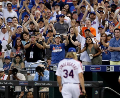 NEW YORK, NY – MAY 28: Fans cheer for Noah Syndergaard #34 of the New York Mets after he was tossed from the game for brushing back Chase Utley #26 of the Los Angeles Dodgers in the third inning at Citi Field on May 28, 2016 in the Flushing neighborhood of the Queens borough of New York City.The New York Mets are honoring the 30th anniversary of the 1986 championship season. (Photo by Elsa/Getty Images)