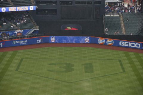 NEW YORK, NY – JULY 30: The number 31 within the border of home plate is cut into the grass for Mike Piazza’s number retirement ceremony before the start of a game between the Colorado Rockies and New York Mets at Citi Field on July 30, 2016 in the Flushing neighborhood of the Queens borough of New York City. (Photo by Rich Schultz/Getty Images)