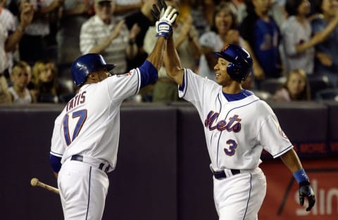 NEW YORK – JULY 11: Damion Easley #3 of the New York Mets celebrates his eighth inning game winning home run against the Colorado Rockies with teammate Fernando Tatis #17 on July 11, 2008 at Shea Stadium in the Flushing neighborhood of the Queens borough of New York City. The Mets won the game 2-1. (Photo by Jim McIsaac/Getty Images)