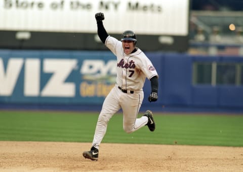 9 Oct 1999: Catcher Todd Pratt #7 of the New York Mets celebrates as he rounds the bases after hitting the game winning home run in the 10 inning during Game Four of the National Lesgue Division Series against the Arizona DiamondBacks at Shea Stadium in Flushing, New York. The Mets defeated the DiamondBacks 4-3Mandatory Credit: Al Bello /Allsport