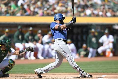 OAKLAND, CA – SEPTEMBER 09: Nomar Mazara #30 of the Texas Rangers hits a sacrifice fly scoring Delino DeShields #3 against the Oakland Athletics in the top of the first inning at Oakland Alameda Coliseum on September 9, 2018 in Oakland, California. (Photo by Thearon W. Henderson/Getty Images)