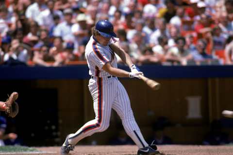 NEW YORK – 1985: Gary Carter #8 of the New York Mets swings for the pitch during the 1985 season at Shea Stadium in New York City, New York. (Photo by Rick Stewart/Getty Images)