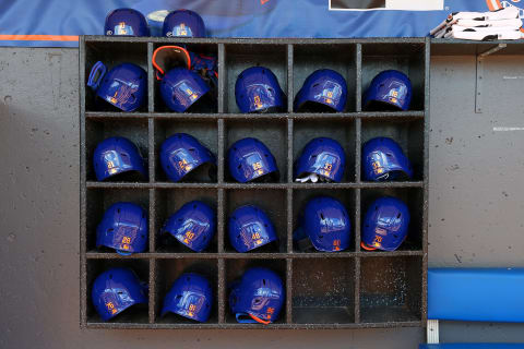 PORT ST. LUCIE, FL – MARCH 11: New York Mets batting helmets in their dugout before a spring training baseball game against the St. Louis Cardinals at Clover Park at on March 11, 2020 in Port St. Lucie, Florida. (Photo by Rich Schultz/Getty Images)