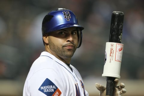 NEW YORK – MAY 06: Omir Santos #9 of the New York Mets at bat against the Philadelphia Phillies at Citi Field on May 6, 2009 in the Flushing neighborhood of the Queens borough of New York City. (Photo by Nick Laham/Getty Images)