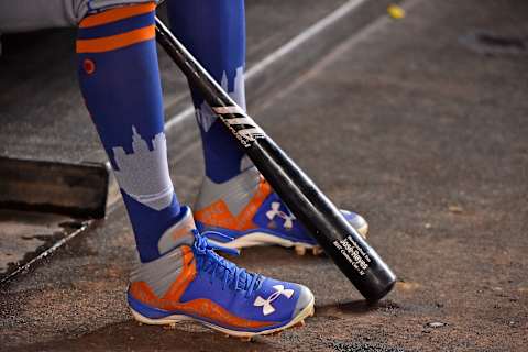 Sep 20, 2017; Miami, FL, USA; A detailed view of the bat and shoes of New York Mets shortstop Jose Reyes (7) as he sits in the dugout between inning against the Miami Marlins at Marlins Park. Mandatory Credit: Jasen Vinlove-USA TODAY Sports